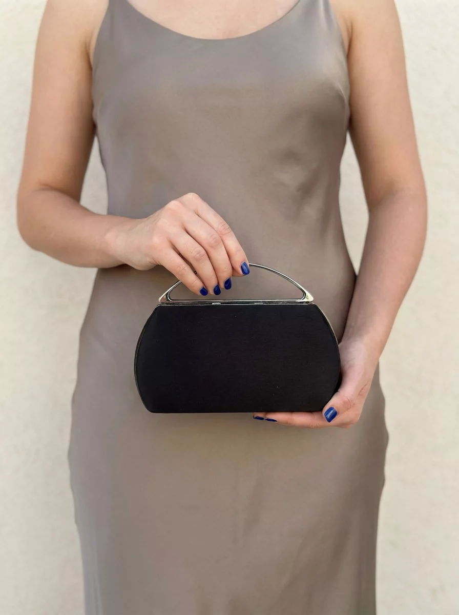 Black satin evening bag with top handle