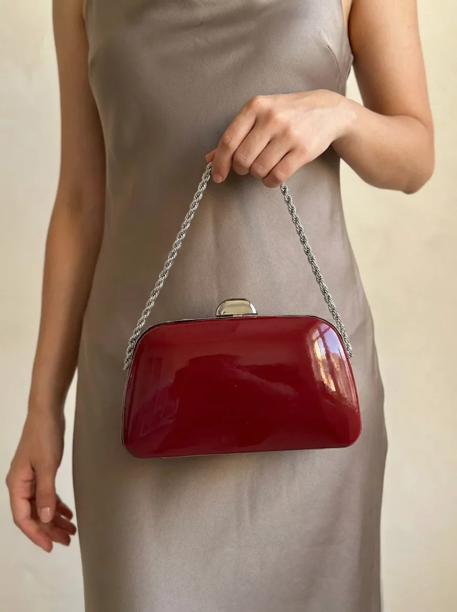 Burgundy patent leather handbag