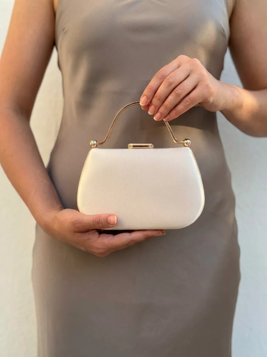 Champagne gold satin clutch with rhinestone handle