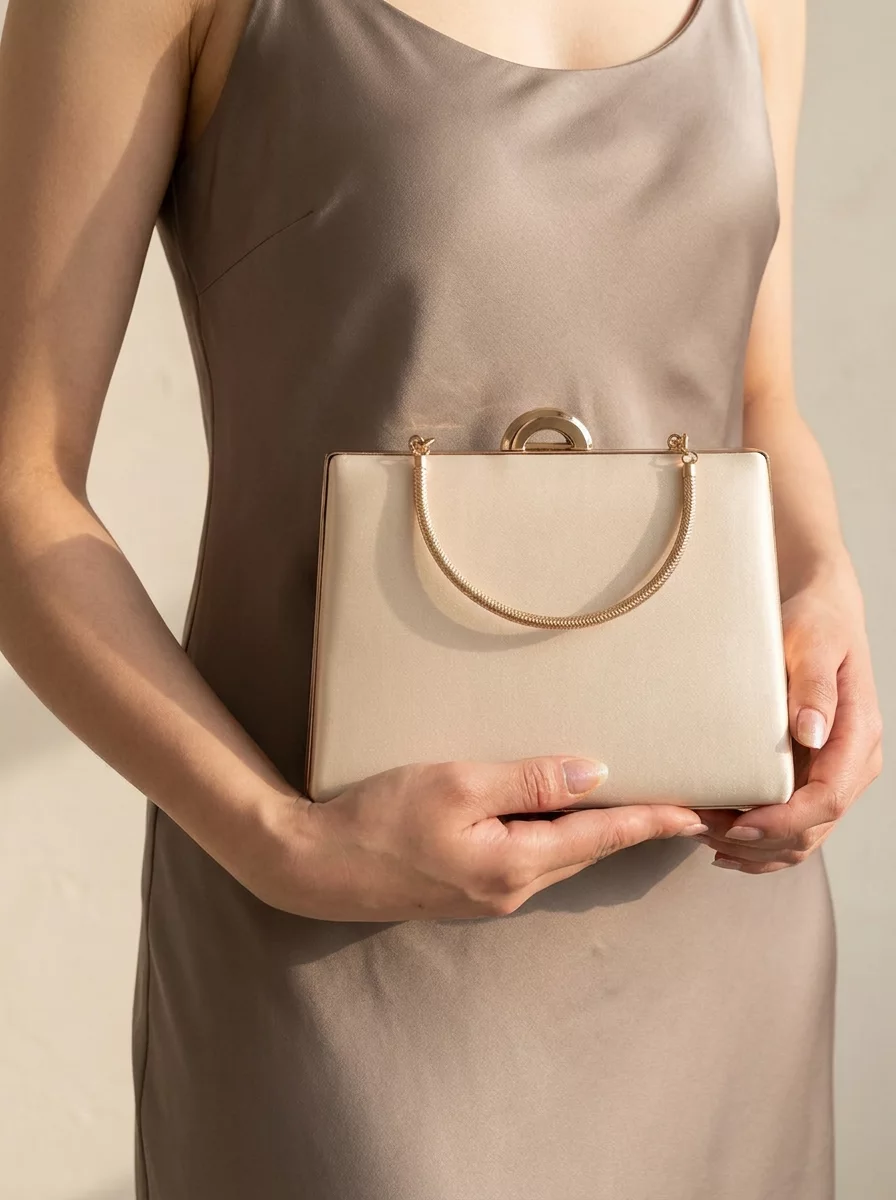 Ivory satin wedding clutch with chain strap