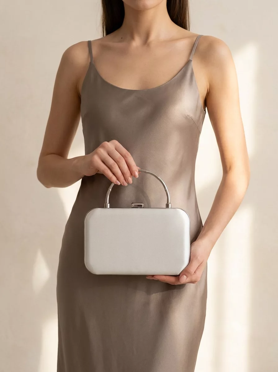Silver satin clutch with top handle